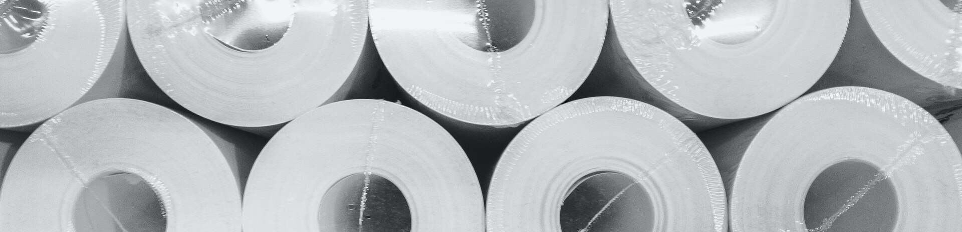 several rolls of toilet paper are stacked on top of each other